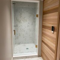 1.0 Large 36 Inch Frameless Door with Gold Hardware