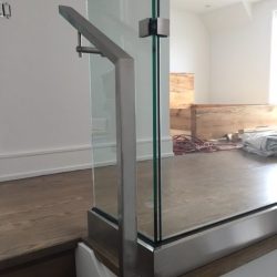 125.0 Stainlesss Handrail Secured to Shoe Mounted Glass Panel